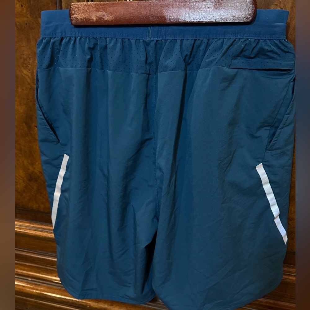 2 pairs of size medium Nike men’s tennis shorts 7” inseam with inner lining.